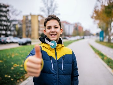 boy giving thumbs up