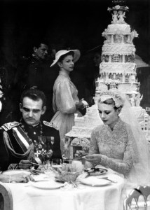 Prince Rainier III of Monaco and US actress and Princess of Monaco Grace Kelly are seen during their wedding lunch in Monaco on April 19, 1956. (Photo credit should read -/AFP via Getty Images)