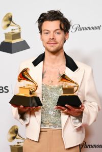Harry Styles poses with his GRAMMY awards for Best Pop Vocal Album and Album of the Year for Harrys House in the Press Room at the 65th Annual GRAMMY Awards held at Crypto.com Arena on February 5, 2023 in Los Angeles, California. (Photo by Michael Buckner/Variety via Getty Images)