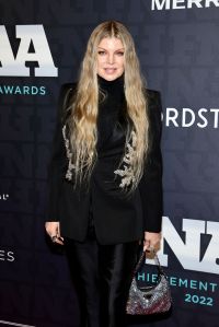 NEW YORK, NEW YORK - NOVEMBER 30: Fergie attends the 2022 Footwear News Achievement Awards at Cipriani South Street on November 30, 2022 in New York City. (Photo by Jamie McCarthy/Footwear News via Getty Images)