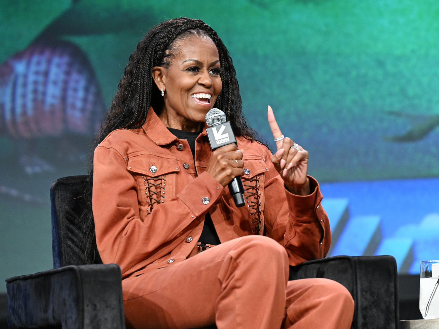 Michelle Obama at Featured Session "IMO Live: Michelle Obama, Craig Robinson & Dr. Laurie Santos" during SXSW Conference & Festivals at Austin Convention Center on March 13, 2025 in Austin, Texas. (Photo by Gilbert Flores/Penske Media via Getty Images)