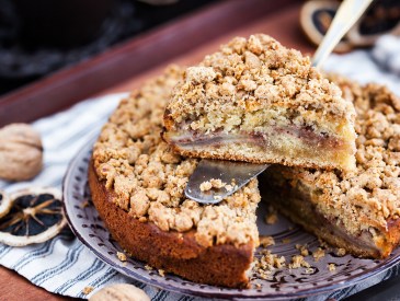 Piece of fresh homemade apple and cinnamon crumb coffee cake