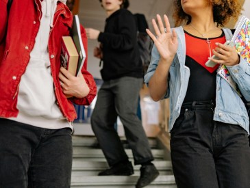 teens in a hallway at school