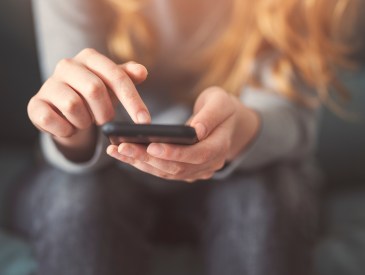 Girl scrolling on phone