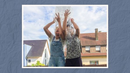 Two teens doing the ice bucket challenge