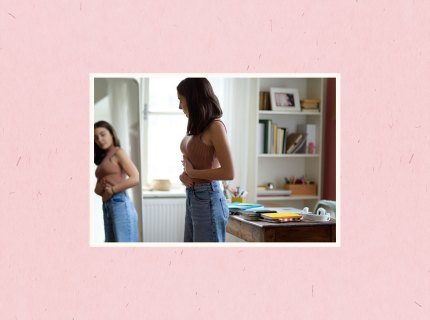 teen looking in mirror