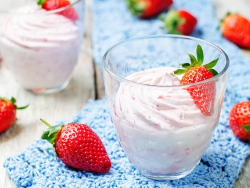 strawberry mousse on a white wooden background. toning. selective focus