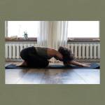 Woman practicing yoga in child's pose