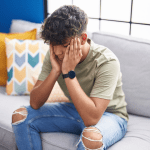Teen looking distressed.