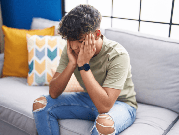 Teen looking distressed.